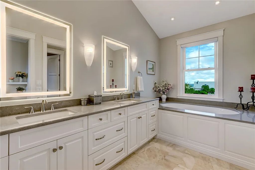 95343 Spinnaker Drive, Fernandina Beach, Florida is an impeccably maintained home was masterfully designed with a focus on outdoor living, restore & relax with amazing sunrises and sunsets from the second level screen porch.