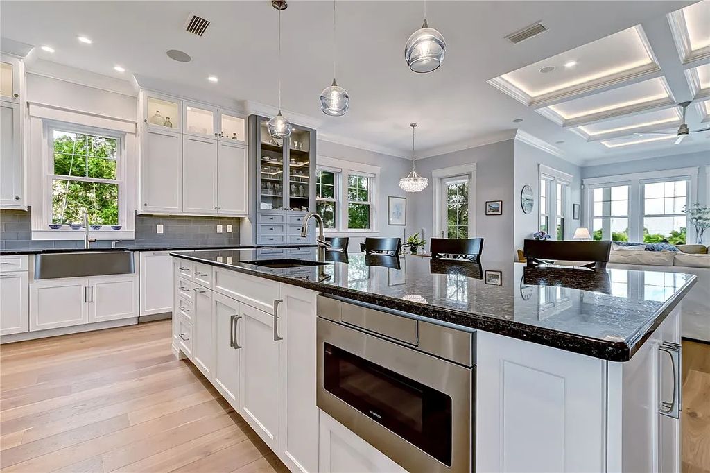 95343 Spinnaker Drive, Fernandina Beach, Florida is an impeccably maintained home was masterfully designed with a focus on outdoor living, restore & relax with amazing sunrises and sunsets from the second level screen porch.
