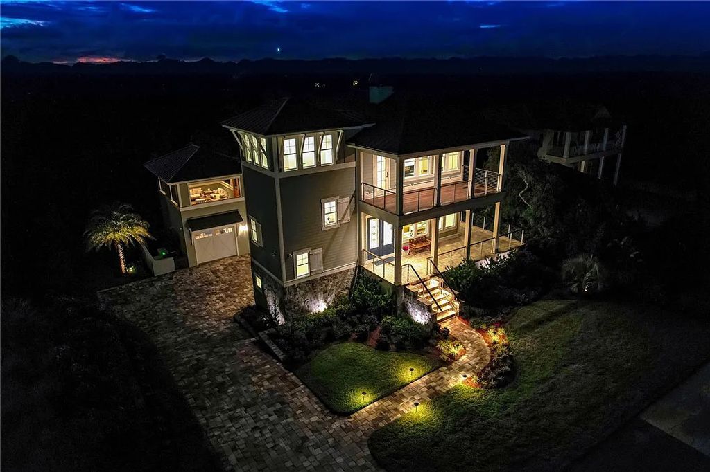 95343 Spinnaker Drive, Fernandina Beach, Florida is an impeccably maintained home was masterfully designed with a focus on outdoor living, restore & relax with amazing sunrises and sunsets from the second level screen porch.