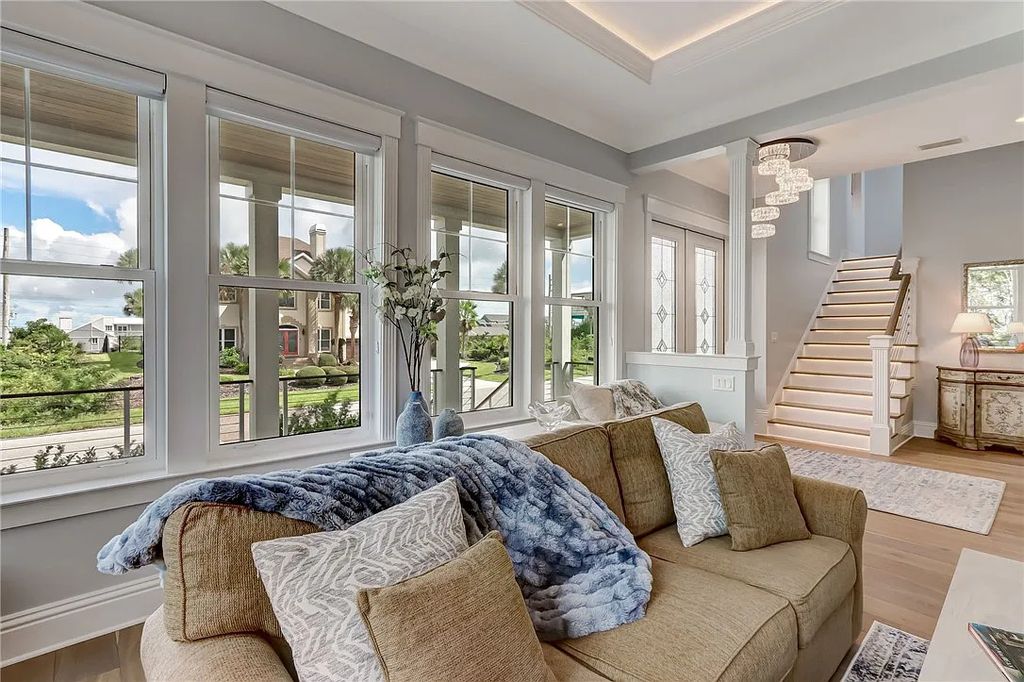 95343 Spinnaker Drive, Fernandina Beach, Florida is an impeccably maintained home was masterfully designed with a focus on outdoor living, restore & relax with amazing sunrises and sunsets from the second level screen porch.