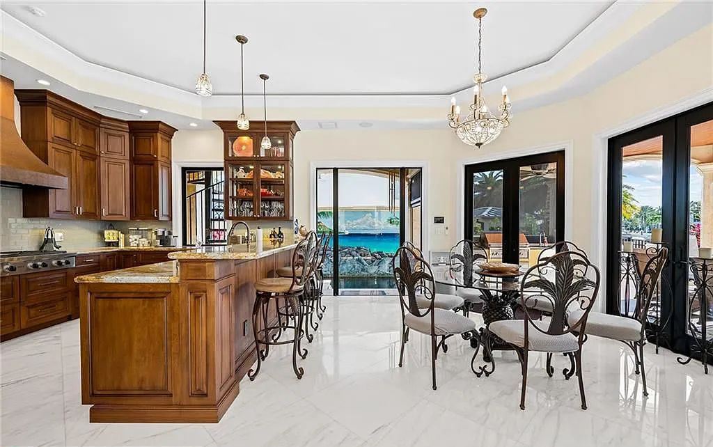 1918 Sunrise Key Boulevard, Fort Lauderdale, Florida is a custom residence built by Rodney Sarkella on secure gated community of Sunrise Key perfect for grand South Florida entertaining.