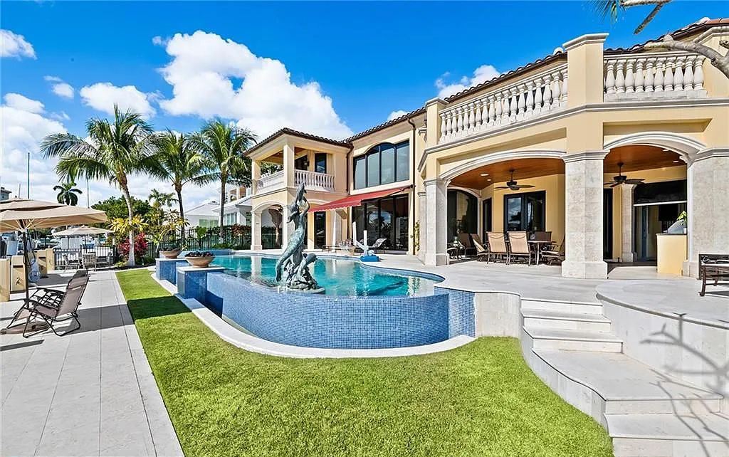 1918 Sunrise Key Boulevard, Fort Lauderdale, Florida is a custom residence built by Rodney Sarkella on secure gated community of Sunrise Key perfect for grand South Florida entertaining.