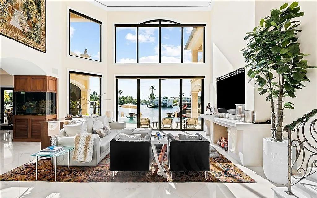1918 Sunrise Key Boulevard, Fort Lauderdale, Florida is a custom residence built by Rodney Sarkella on secure gated community of Sunrise Key perfect for grand South Florida entertaining.