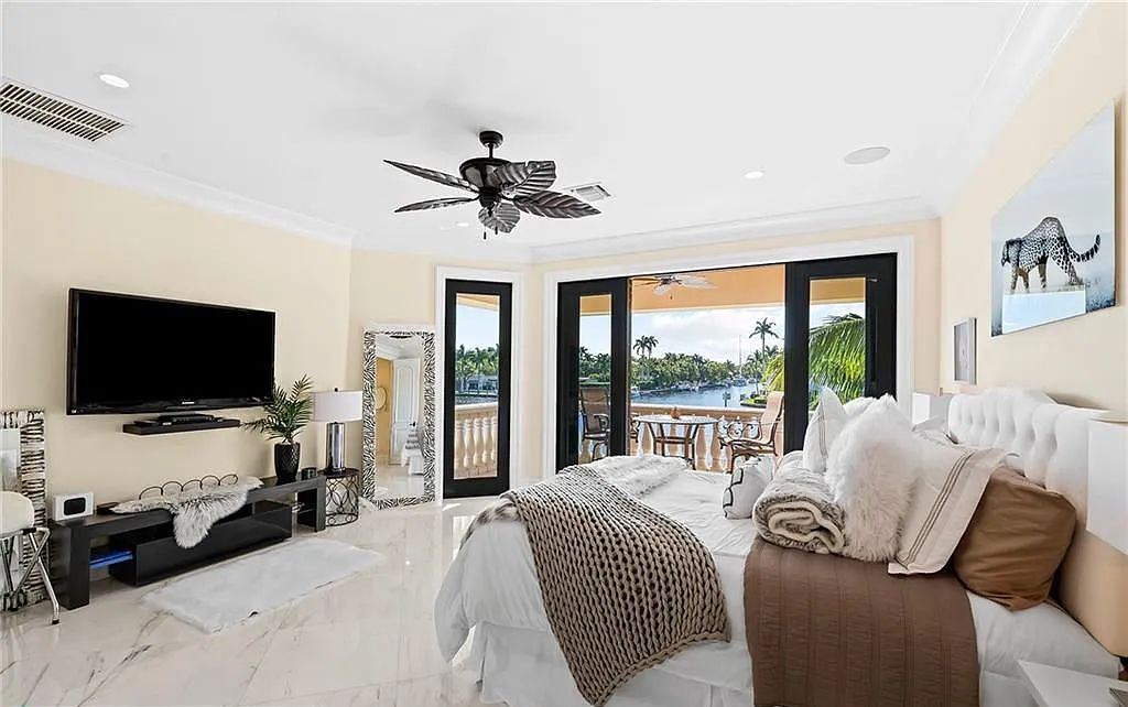 1918 Sunrise Key Boulevard, Fort Lauderdale, Florida is a custom residence built by Rodney Sarkella on secure gated community of Sunrise Key perfect for grand South Florida entertaining.