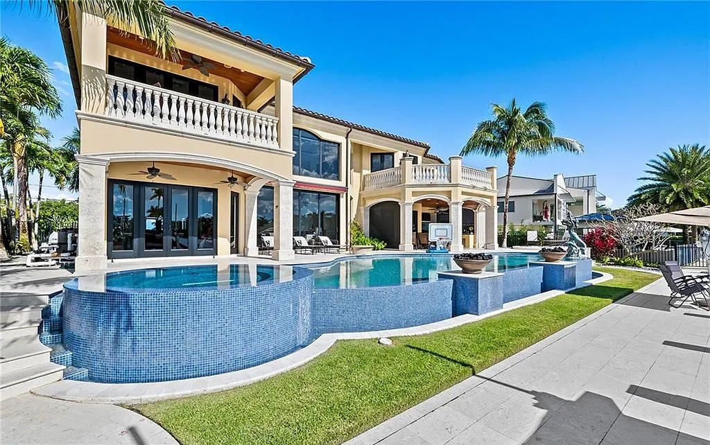 1918 Sunrise Key Boulevard, Fort Lauderdale, Florida is a custom residence built by Rodney Sarkella on secure gated community of Sunrise Key perfect for grand South Florida entertaining.