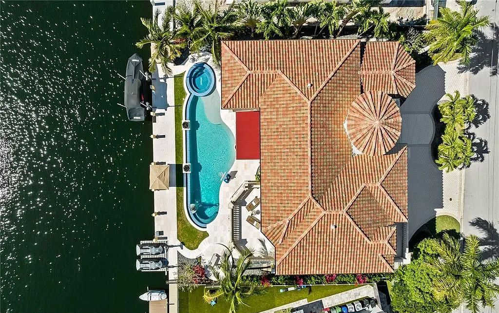 1918 Sunrise Key Boulevard, Fort Lauderdale, Florida is a custom residence built by Rodney Sarkella on secure gated community of Sunrise Key perfect for grand South Florida entertaining.
