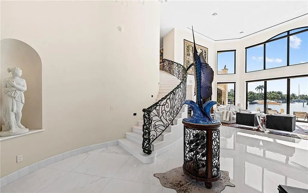 1918 Sunrise Key Boulevard, Fort Lauderdale, Florida is a custom residence built by Rodney Sarkella on secure gated community of Sunrise Key perfect for grand South Florida entertaining.