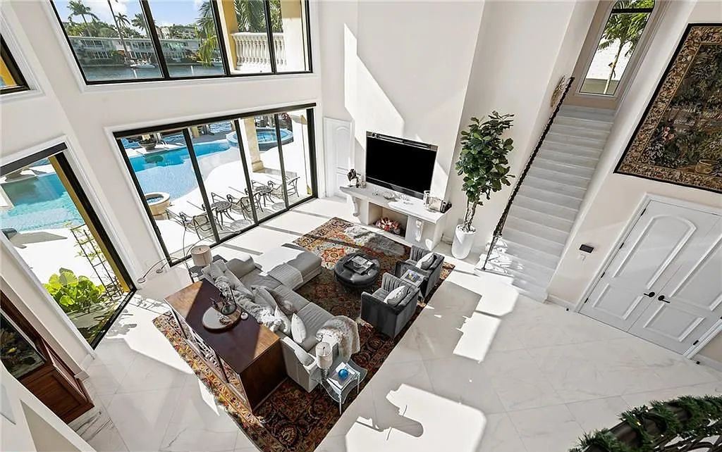 1918 Sunrise Key Boulevard, Fort Lauderdale, Florida is a custom residence built by Rodney Sarkella on secure gated community of Sunrise Key perfect for grand South Florida entertaining.