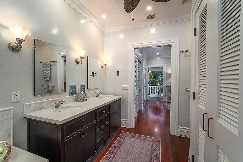 408 United Street, Key West, Florida, located in the most sought after location in Old Town, nestled between world famous Duval St & Whitehead St, mere steps to the beach, Southernmost Point, restaurants. This Trophy residence sits on a premium 5,109 sq ft lot, with abundant exotic tropical landscaping.