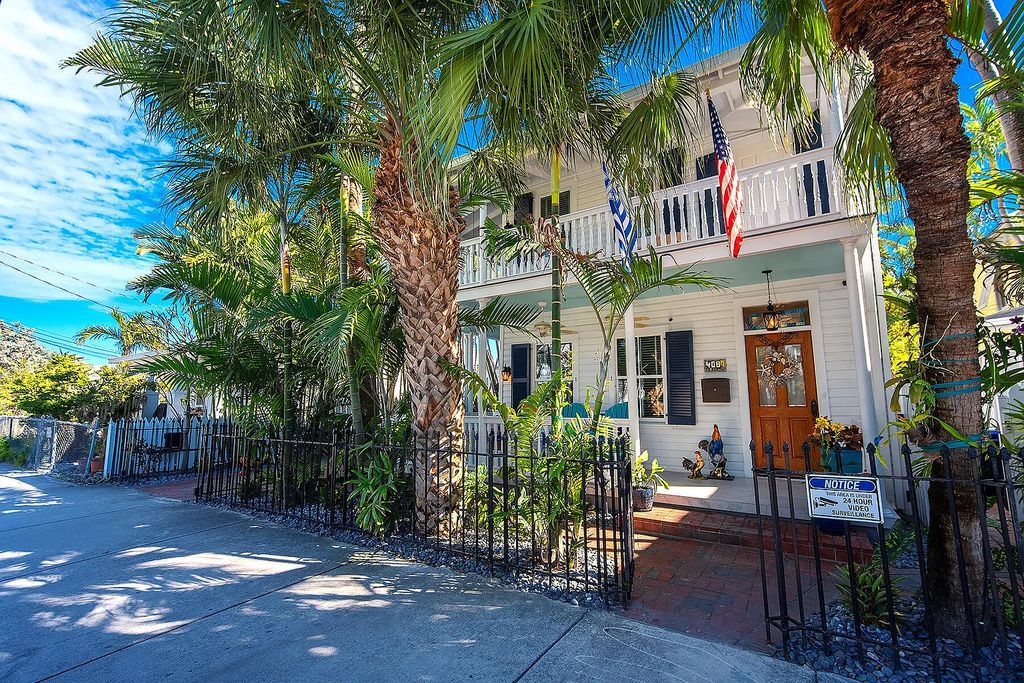 408 United Street, Key West, Florida, located in the most sought after location in Old Town, nestled between world famous Duval St & Whitehead St, mere steps to the beach, Southernmost Point, restaurants. This Trophy residence sits on a premium 5,109 sq ft lot, with abundant exotic tropical landscaping.