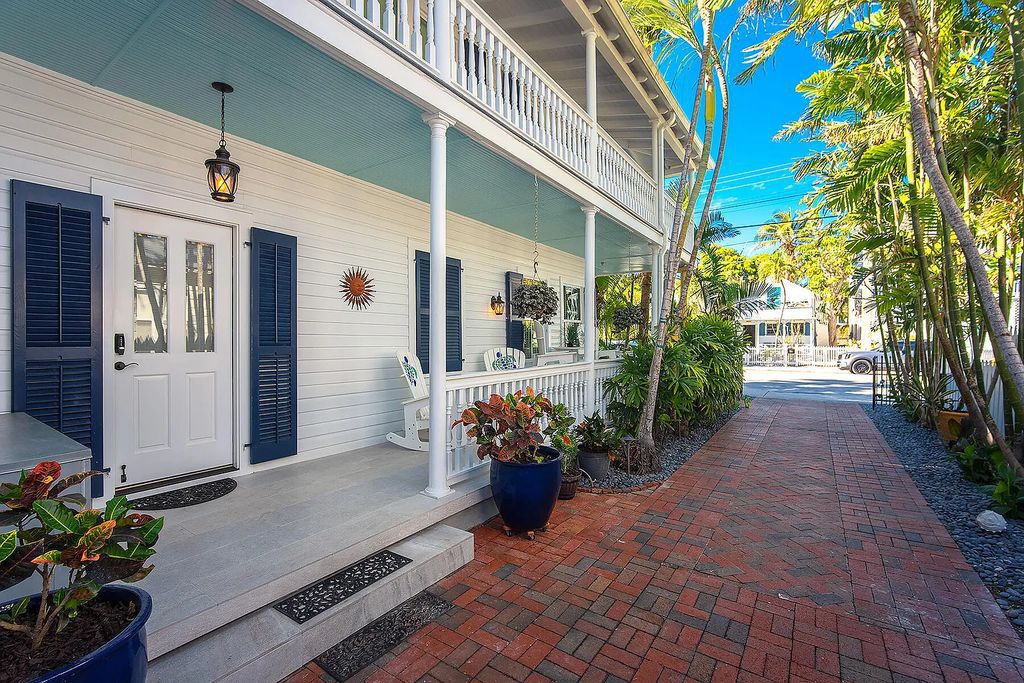 408 United Street, Key West, Florida, located in the most sought after location in Old Town, nestled between world famous Duval St & Whitehead St, mere steps to the beach, Southernmost Point, restaurants. This Trophy residence sits on a premium 5,109 sq ft lot, with abundant exotic tropical landscaping.