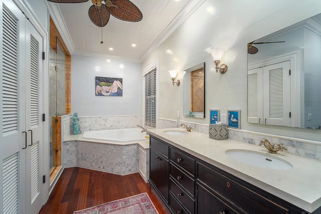 408 United Street, Key West, Florida, located in the most sought after location in Old Town, nestled between world famous Duval St & Whitehead St, mere steps to the beach, Southernmost Point, restaurants. This Trophy residence sits on a premium 5,109 sq ft lot, with abundant exotic tropical landscaping.