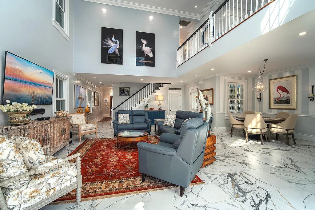 408 United Street, Key West, Florida, located in the most sought after location in Old Town, nestled between world famous Duval St & Whitehead St, mere steps to the beach, Southernmost Point, restaurants. This Trophy residence sits on a premium 5,109 sq ft lot, with abundant exotic tropical landscaping.