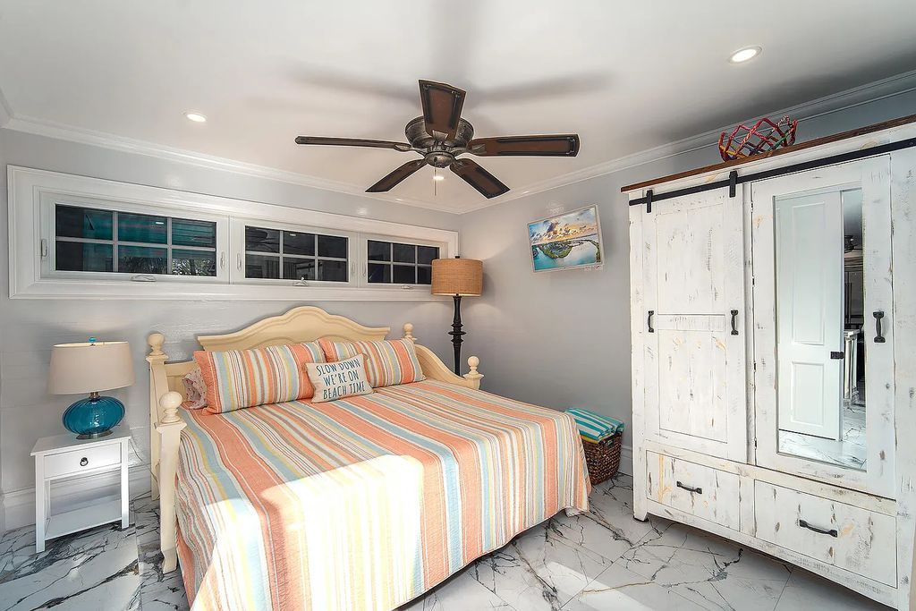 408 United Street, Key West, Florida, located in the most sought after location in Old Town, nestled between world famous Duval St & Whitehead St, mere steps to the beach, Southernmost Point, restaurants. This Trophy residence sits on a premium 5,109 sq ft lot, with abundant exotic tropical landscaping.