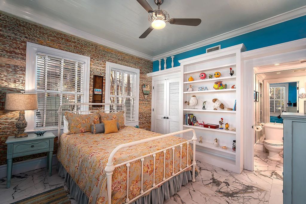 408 United Street, Key West, Florida, located in the most sought after location in Old Town, nestled between world famous Duval St & Whitehead St, mere steps to the beach, Southernmost Point, restaurants. This Trophy residence sits on a premium 5,109 sq ft lot, with abundant exotic tropical landscaping.