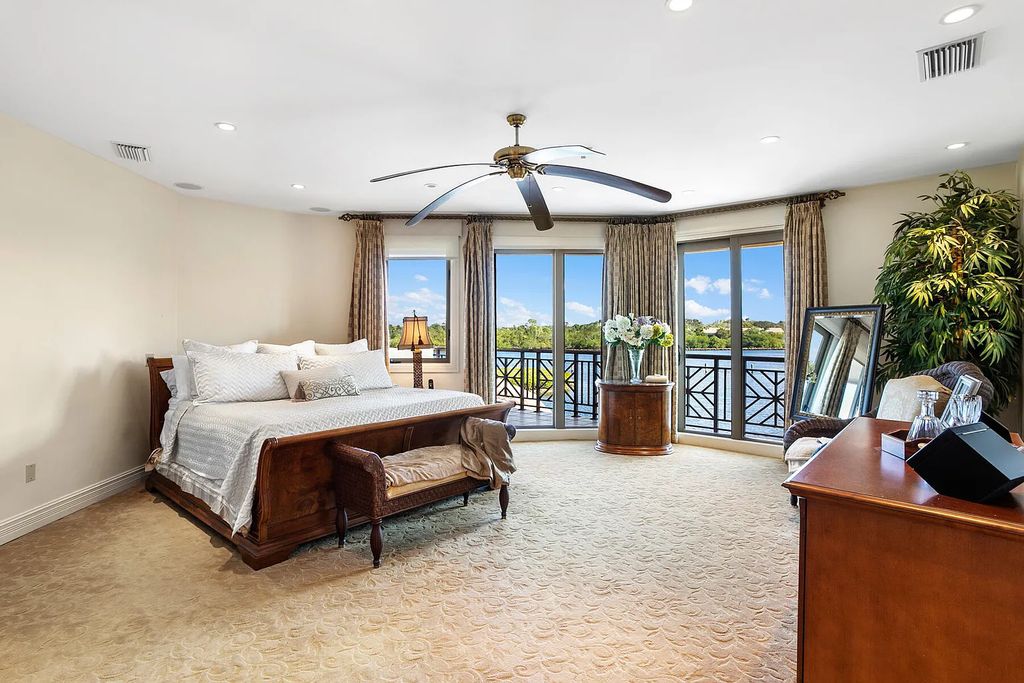 217 Commodore Drive, Jupiter, Florida is a stunning property sit on one of the largest water frontage lots on Commodore Island surrounded by new custom estates, a resort style pool with stunning orange sunsets and intracoastal activity.