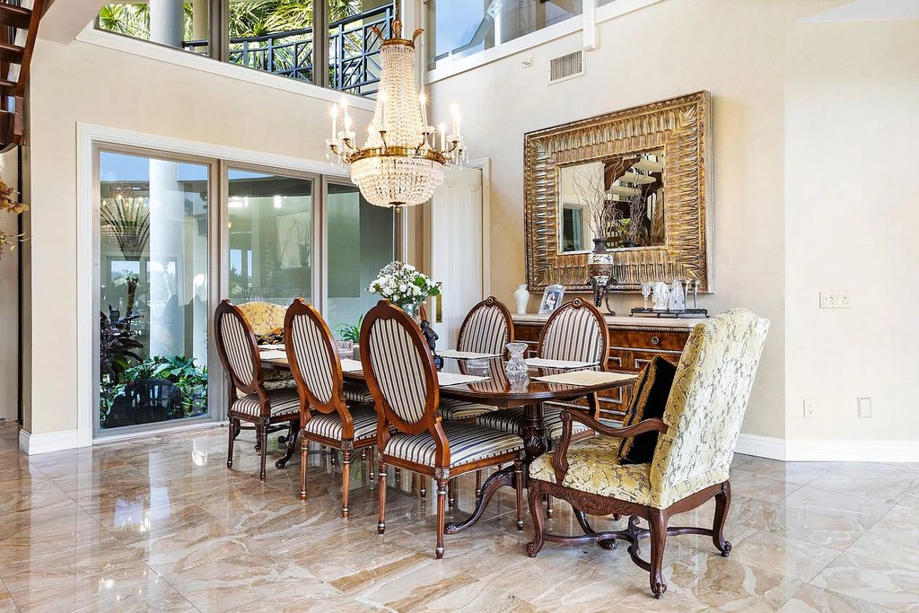 217 Commodore Drive, Jupiter, Florida is a stunning property sit on one of the largest water frontage lots on Commodore Island surrounded by new custom estates, a resort style pool with stunning orange sunsets and intracoastal activity.
