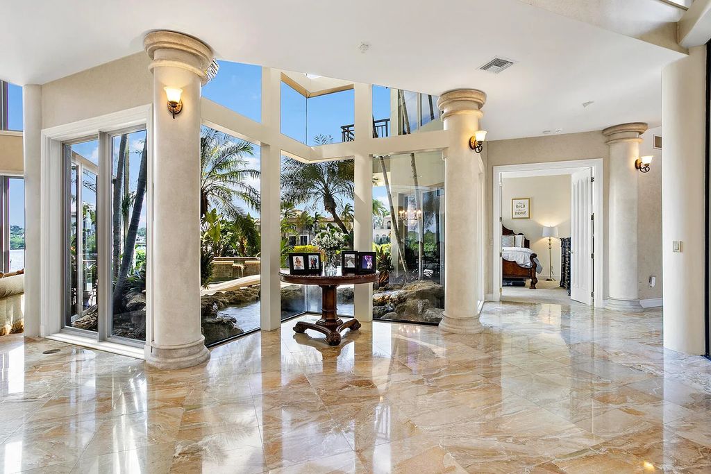 217 Commodore Drive, Jupiter, Florida is a stunning property sit on one of the largest water frontage lots on Commodore Island surrounded by new custom estates, a resort style pool with stunning orange sunsets and intracoastal activity.