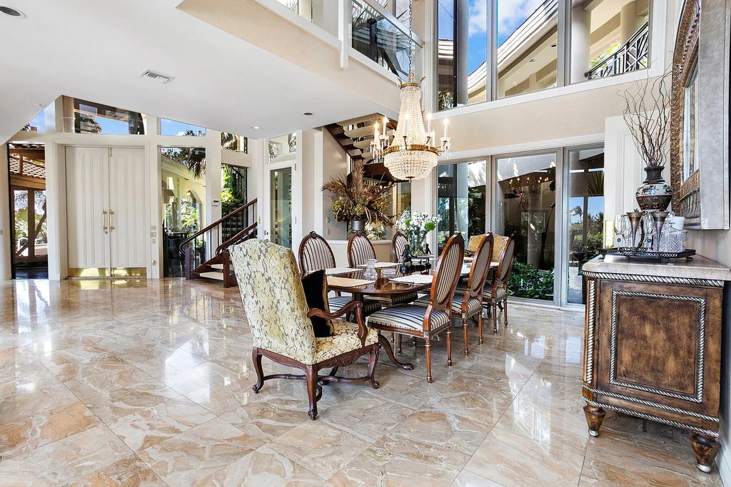 217 Commodore Drive, Jupiter, Florida is a stunning property sit on one of the largest water frontage lots on Commodore Island surrounded by new custom estates, a resort style pool with stunning orange sunsets and intracoastal activity.