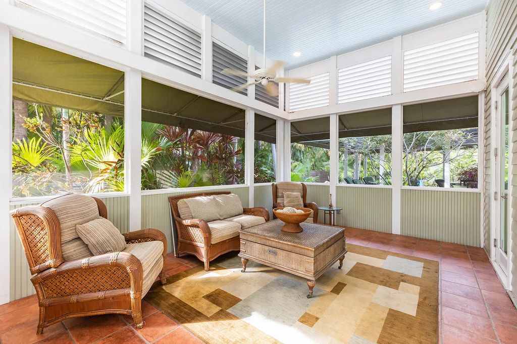 101 Admirals Lane, Key West, Florida,  provides privacy and a lush atmosphere for this remarkable home on a huge 14,000 SF lot, surrounded by a wall of tropical foliage. It is a spectacular property on one of the largest lots in the gated community of Truman Annex, featuring three separate dwellings blending traditional and contemporary architecture.