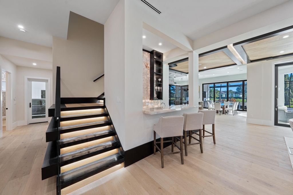 28901 Girard Terrace, Naples, Florida is an exceptional home was renovated from top to bottom and inside and out, features all new drywall, electrical, plumbing, new gas lines, new impact sliders and Anderson windows and doors plus a brand new roof. 