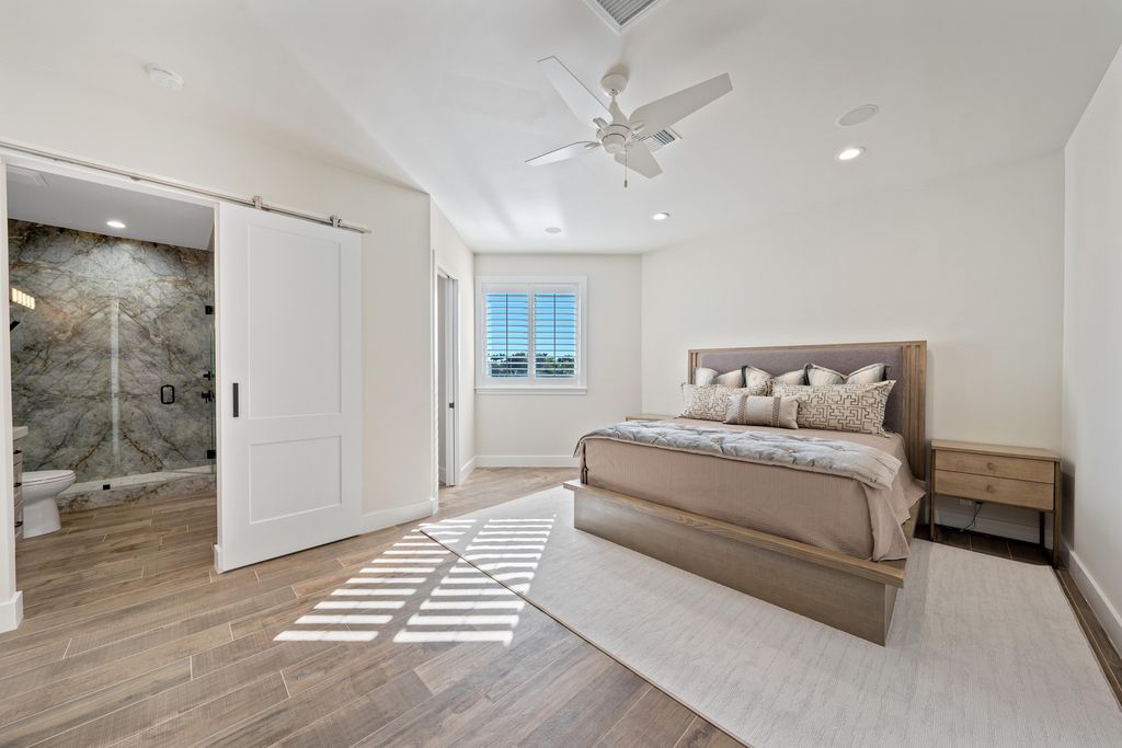 28901 Girard Terrace, Naples, Florida is an exceptional home was renovated from top to bottom and inside and out, features all new drywall, electrical, plumbing, new gas lines, new impact sliders and Anderson windows and doors plus a brand new roof. 