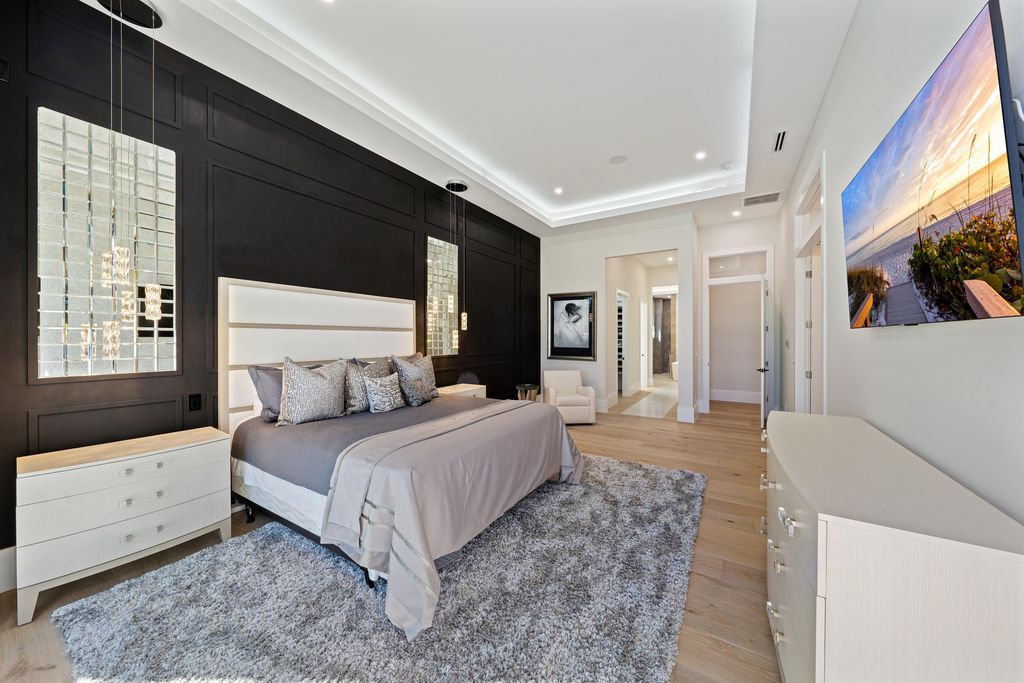 28901 Girard Terrace, Naples, Florida is an exceptional home was renovated from top to bottom and inside and out, features all new drywall, electrical, plumbing, new gas lines, new impact sliders and Anderson windows and doors plus a brand new roof. 