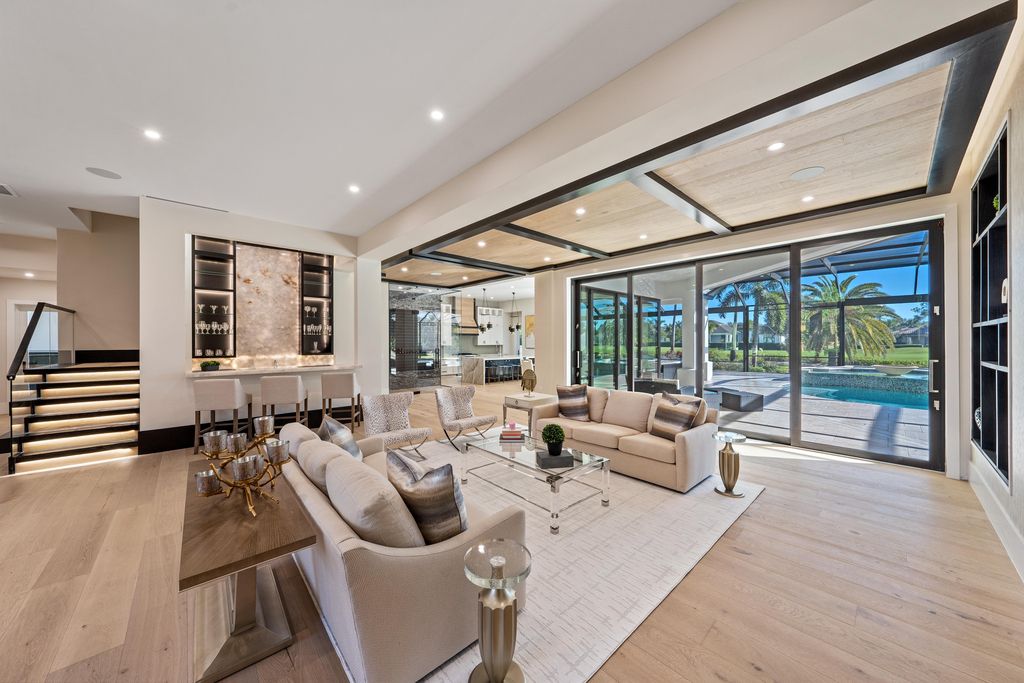 28901 Girard Terrace, Naples, Florida is an exceptional home was renovated from top to bottom and inside and out, features all new drywall, electrical, plumbing, new gas lines, new impact sliders and Anderson windows and doors plus a brand new roof. 