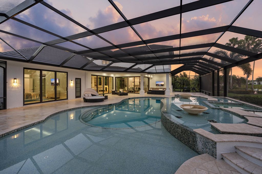 28901 Girard Terrace, Naples, Florida is an exceptional home was renovated from top to bottom and inside and out, features all new drywall, electrical, plumbing, new gas lines, new impact sliders and Anderson windows and doors plus a brand new roof. 