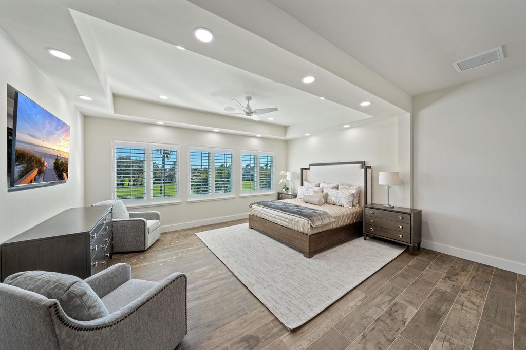 28901 Girard Terrace, Naples, Florida is an exceptional home was renovated from top to bottom and inside and out, features all new drywall, electrical, plumbing, new gas lines, new impact sliders and Anderson windows and doors plus a brand new roof. 