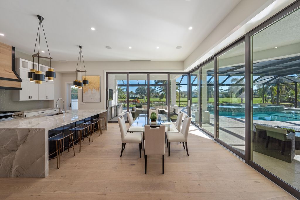 28901 Girard Terrace, Naples, Florida is an exceptional home was renovated from top to bottom and inside and out, features all new drywall, electrical, plumbing, new gas lines, new impact sliders and Anderson windows and doors plus a brand new roof. 