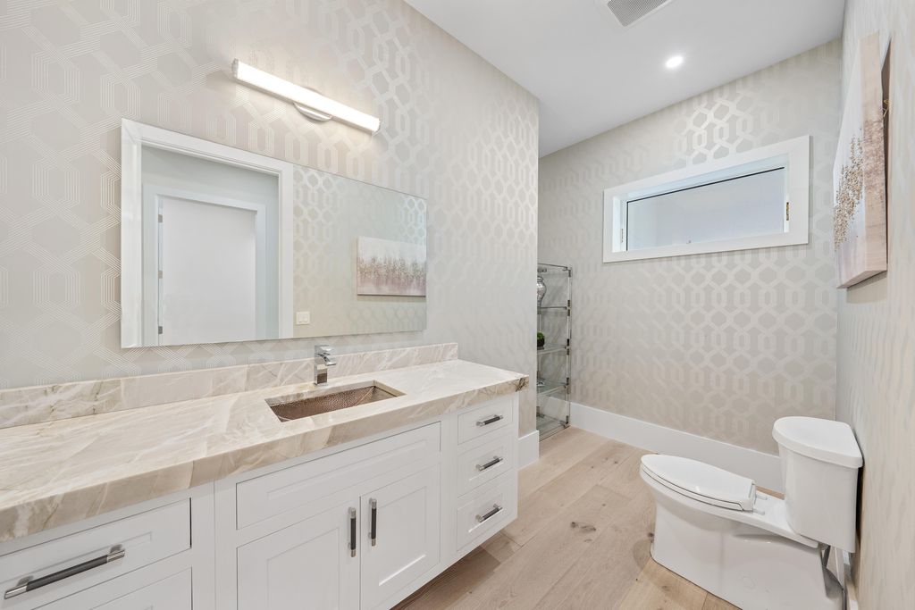 28901 Girard Terrace, Naples, Florida is an exceptional home was renovated from top to bottom and inside and out, features all new drywall, electrical, plumbing, new gas lines, new impact sliders and Anderson windows and doors plus a brand new roof. 