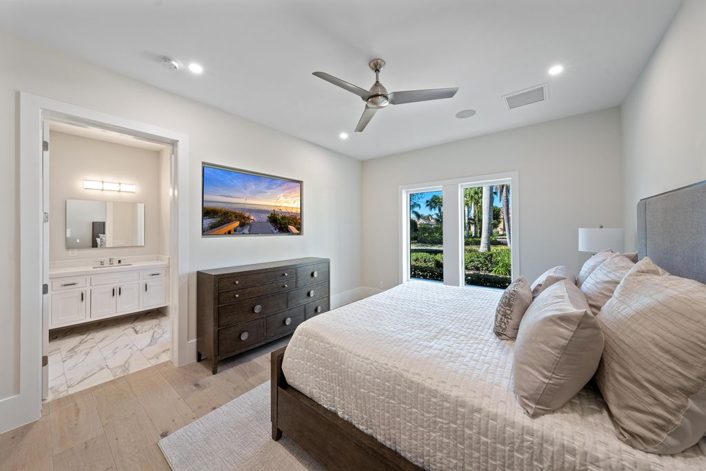28901 Girard Terrace, Naples, Florida is an exceptional home was renovated from top to bottom and inside and out, features all new drywall, electrical, plumbing, new gas lines, new impact sliders and Anderson windows and doors plus a brand new roof. 