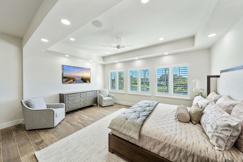 28901 Girard Terrace, Naples, Florida is an exceptional home was renovated from top to bottom and inside and out, features all new drywall, electrical, plumbing, new gas lines, new impact sliders and Anderson windows and doors plus a brand new roof. 