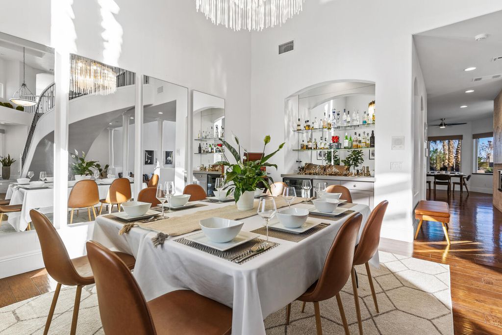 2000 Bogart Court, Las Vegas, Nevada is a one of a kind home situated on a cul-de-sac inside a private gated community featuring stunning finishes throughout with Limestone and hardwood flooring, quartzite fireplace, motorized window shades and grand 24” foot ceilings.
