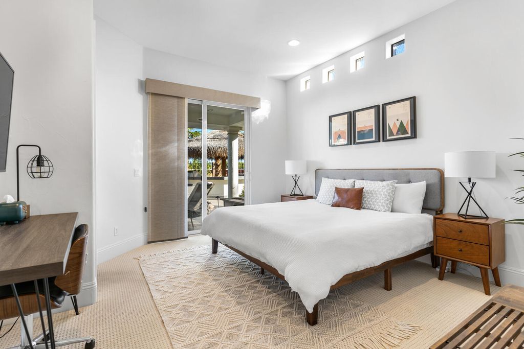 2000 Bogart Court, Las Vegas, Nevada is a one of a kind home situated on a cul-de-sac inside a private gated community featuring stunning finishes throughout with Limestone and hardwood flooring, quartzite fireplace, motorized window shades and grand 24” foot ceilings.