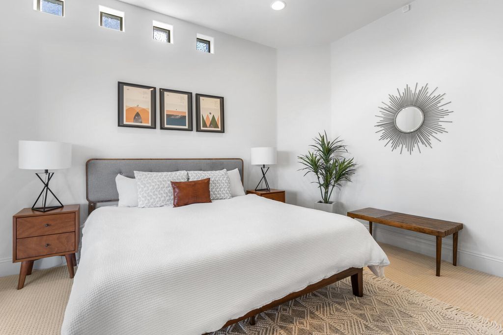 2000 Bogart Court, Las Vegas, Nevada is a one of a kind home situated on a cul-de-sac inside a private gated community featuring stunning finishes throughout with Limestone and hardwood flooring, quartzite fireplace, motorized window shades and grand 24” foot ceilings.