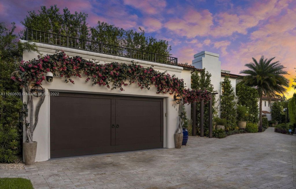 2901 Flamingo Drive, Miami Beach, Florida is named La Joya with 300 foot of water in most vibrant neighborhood on Miami Beach, features include dramatic master + sitting rm. 13ft ceilings, wall of glass, + 3 terraces. 4 beds up 1 down+ office/library. 1 bd, 1 and a half bath guest villa with private patio, 2 car garage, private gated entry court.