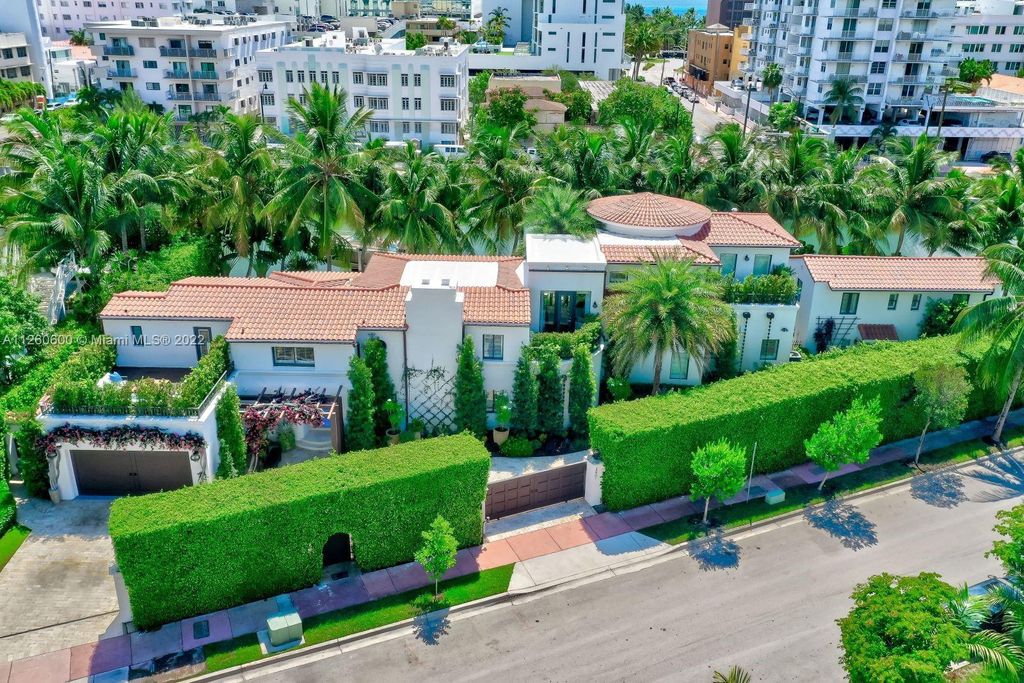 2901 Flamingo Drive, Miami Beach, Florida is named La Joya with 300 foot of water in most vibrant neighborhood on Miami Beach, features include dramatic master + sitting rm. 13ft ceilings, wall of glass, + 3 terraces. 4 beds up 1 down+ office/library. 1 bd, 1 and a half bath guest villa with private patio, 2 car garage, private gated entry court.