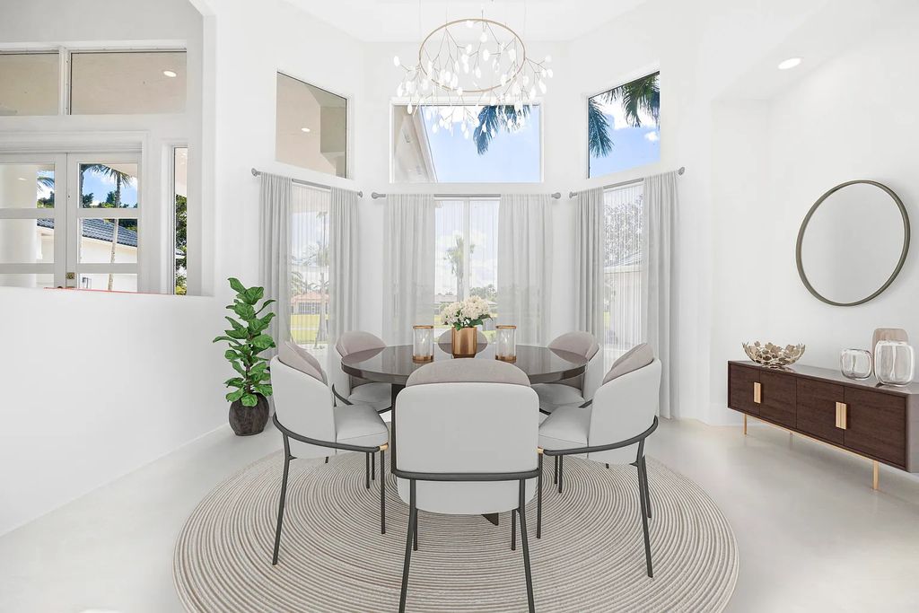 11795 Littlestone Court, Palm Beach Gardens, Florida is a stunning renovated one story house with golf views overlooking the PGA National Golf Course, filled with sunlight rooms, stylish welcoming spaces offering areas for intimate or grand-scale gatherings.