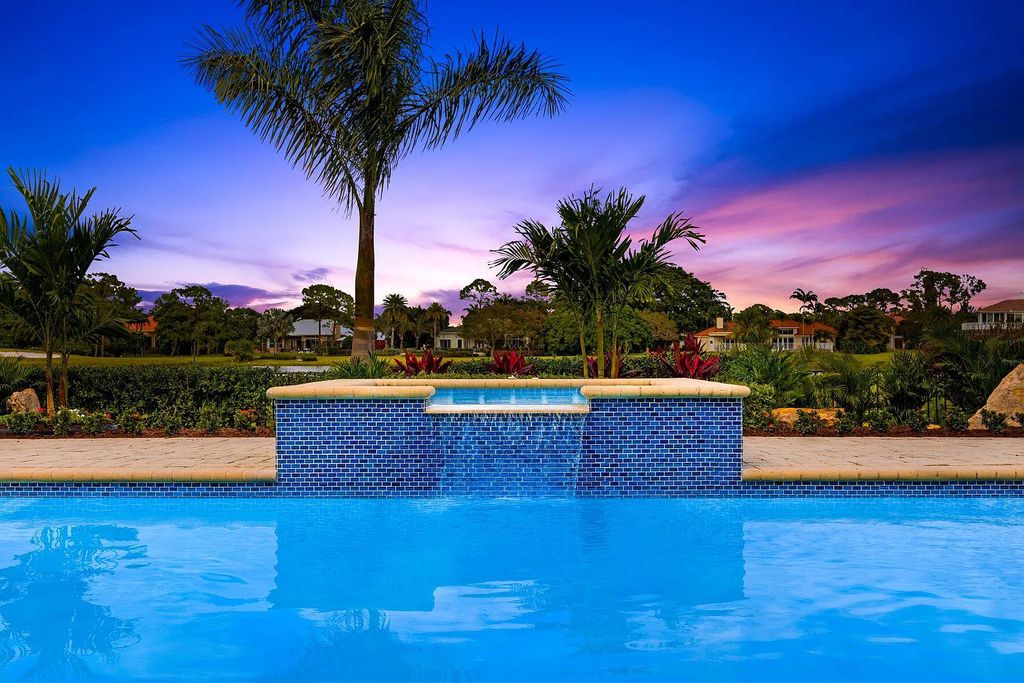 11795 Littlestone Court, Palm Beach Gardens, Florida is a stunning renovated one story house with golf views overlooking the PGA National Golf Course, filled with sunlight rooms, stylish welcoming spaces offering areas for intimate or grand-scale gatherings.