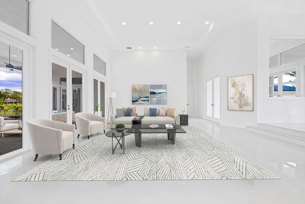 11795 Littlestone Court, Palm Beach Gardens, Florida is a stunning renovated one story house with golf views overlooking the PGA National Golf Course, filled with sunlight rooms, stylish welcoming spaces offering areas for intimate or grand-scale gatherings.