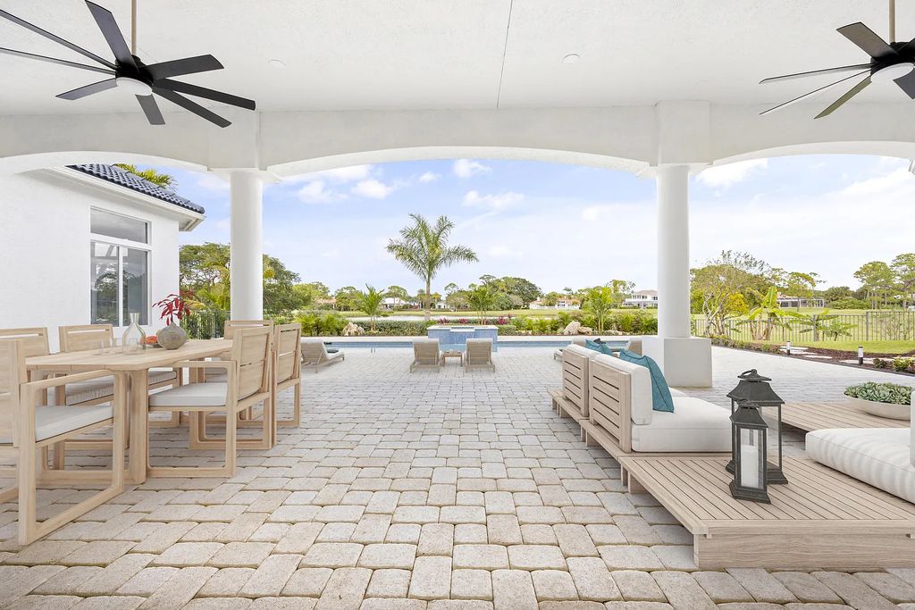 11795 Littlestone Court, Palm Beach Gardens, Florida is a stunning renovated one story house with golf views overlooking the PGA National Golf Course, filled with sunlight rooms, stylish welcoming spaces offering areas for intimate or grand-scale gatherings.