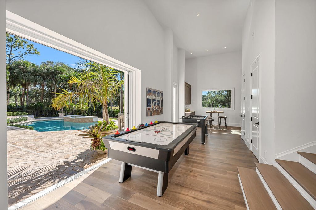 2712 Buckthorn Way, Naples, Florida is an exquisitely remodeled Estate residence perfect to to entertain in, with home theater, game room, bar, wine cellar, and plenty of spaces. 