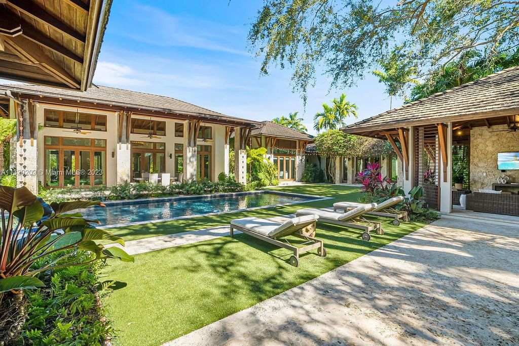 8601 Ponce De Leon Road, Miami, Florida, is ideal for family gatherings while providing ample indoor/outdoor spaces for a recreational and relaxing living experience.