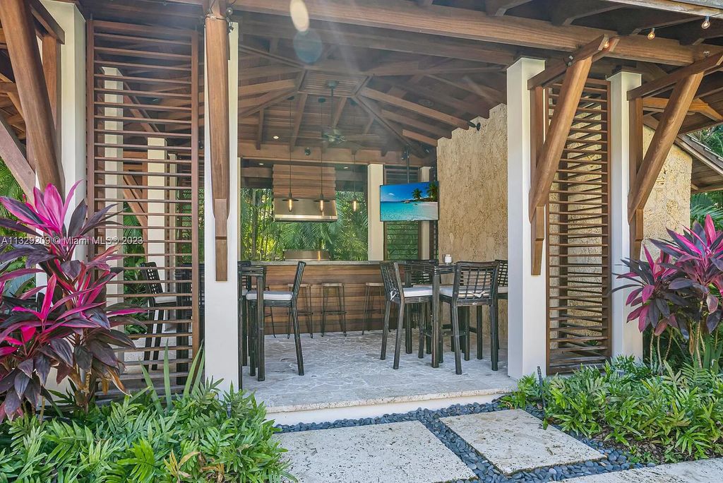 8601 Ponce De Leon Road, Miami, Florida, is ideal for family gatherings while providing ample indoor/outdoor spaces for a recreational and relaxing living experience.