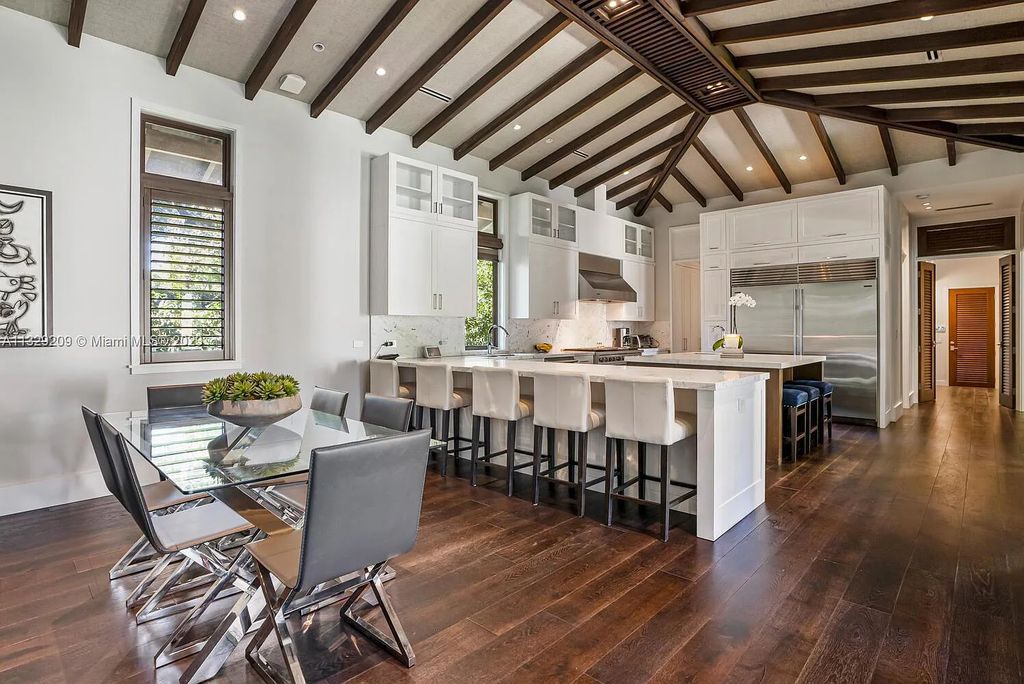 8601 Ponce De Leon Road, Miami, Florida, is ideal for family gatherings while providing ample indoor/outdoor spaces for a recreational and relaxing living experience.