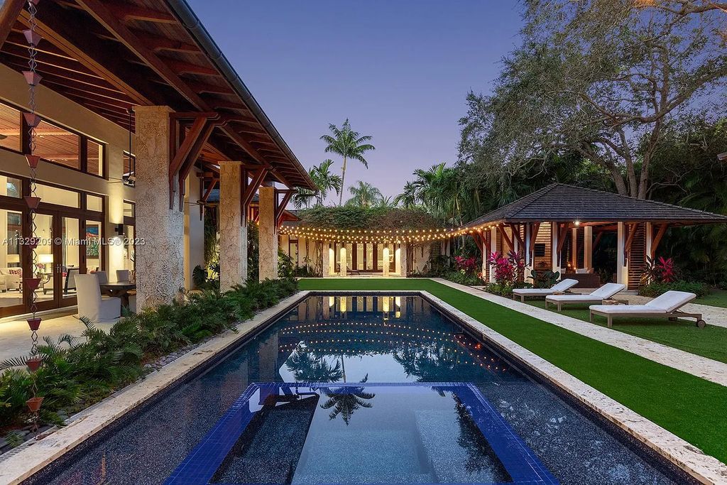 8601 Ponce De Leon Road, Miami, Florida, is ideal for family gatherings while providing ample indoor/outdoor spaces for a recreational and relaxing living experience.