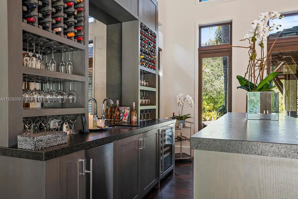 8601 Ponce De Leon Road, Miami, Florida, is ideal for family gatherings while providing ample indoor/outdoor spaces for a recreational and relaxing living experience.