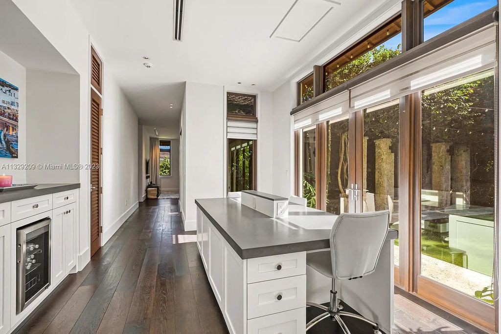 8601 Ponce De Leon Road, Miami, Florida, is ideal for family gatherings while providing ample indoor/outdoor spaces for a recreational and relaxing living experience.